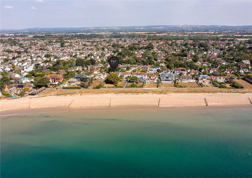 Aerial view beach and residential housing - House purchase in Middleton-on-Sea, 4 rooms, 5 bedrooms