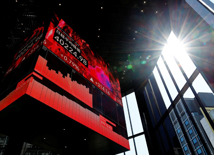 An electronic screen displaying Japan’s Nikkei share average is pictured in Tokyo, Japan. Picture: REUTERS/KIM KYUNG-HOON