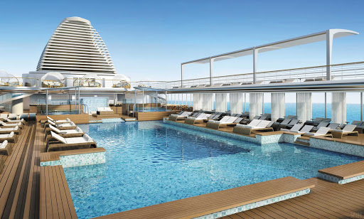 Lounge the day away under the warm sun and take in the views on the Pool Deck of Seven Seas Explorer, designed with teak accents. 