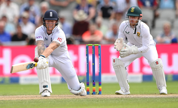 South Africa wicketkeeper Kyle Verreynne looks on as Ben Stokes reverse sweeps during day two of the second test match between England and South Africa at Old Trafford on August 26, 2022 in Manchester, England.