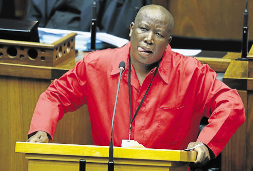 ROOI GEVAAR: EFF leader Julius Malema made sure no one nodded off in the National Assembly yesterday when he responded to President Jacob Zuma's State of the Nation speech
