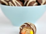 Peanut Butter Cookie Dough Truffles was pinched from <a href="http://www.shugarysweets.com/2013/05/peanut-butter-cookie-dough-truffles" target="_blank">www.shugarysweets.com.</a>