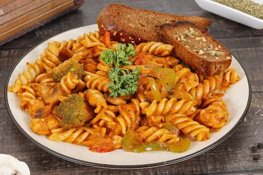 Chicken In Signature Red Mushroom Sauce- Served With Fusilli Pasta