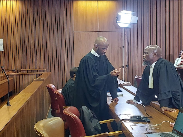 Disbarred advocate Malesela Teffo speaking to lawyers for the defence in court on Tuesday.