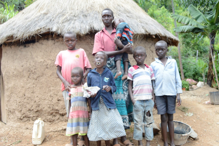 Malnourished 17-year old girl Faith Jeptui with her siblings and mother Monica Rerimoi at their homein Sessoi in Saimo-Soi ward in Baringo North on Wednesday, November 11.1