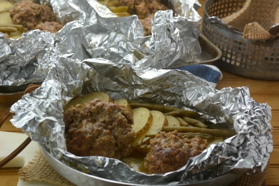 Meat and potatoes in a foil packet. 