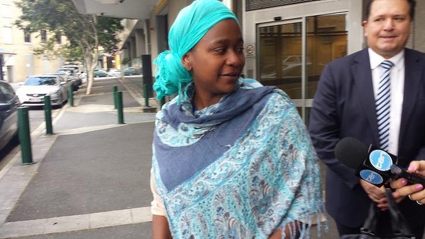 Esther Arunga leaves an Australian court after her bail hearing.