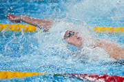 Pieter Coetzé in action in the men's 100m backstroke final in Doha. 