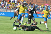 Hlompho Kekana of Mamelodi Sundowns and Ntsikelelo Nyauza of Orlando Pirates during the Absa Premiership match between Mamelodi Sundowns and Orlando Pirates at Loftus Versfeld Stadium on January 13, 2018 in Pretoria, South Africa. 