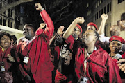 UNDAUNTED:  EFF members promise to continue wearing the party regalia in public places despite the attack on party members in the West Rand at the weekend 
      
      
      
      Photo: SHELLEY CHRISTIANS