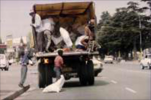 DESPERATION: In most cases children in rural and farming areas are pushed into child labour by adverse poverty. Pic. Veli Nhlapo. 25/07/00. © Sowetan.