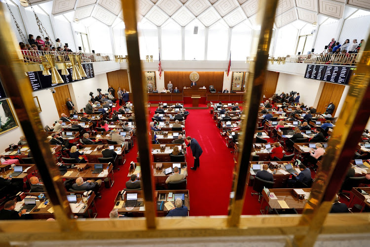 Members of the North Carolina legislature’s House chamber meet before an imminent debate over a bill limiting most abortions to the first trimester of pregnancy, a sharp drop from the state’s current limit of 20 weeks gestation, at the State Capitol in Raleigh, North Carolina, US, May 3, 2023.