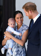 Prince Harry and Meghan, Duchess of Sussex, with their son Archie Mountbatten-Windsor, on their royal tour of southern Africa on September 25 2019 in Cape Town.