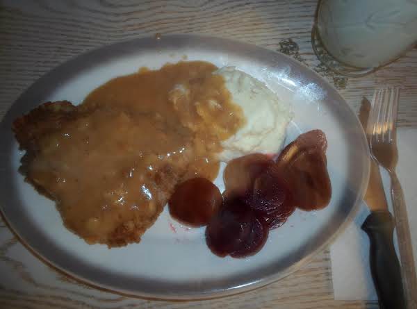 COUNTRY FRIED STEAK w/BROWN ONION GRAVY_image