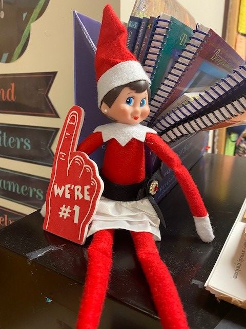 elf on the shelf in upper elementary classroom