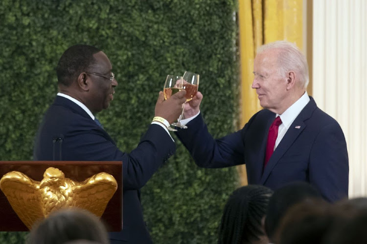 US President Joe Biden, right, toasts with Senegal's president Macky Sall during the US-Africa Leaders' Summit dinner in Washington DC, US, attended by African leaders from 49 countries and the African Union.