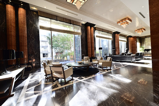 Luxurious entrance hall with marble columns - Buy this luxury apartment / penthouse in Minato City, 2 bedrooms