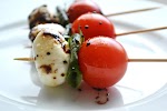 Caprese Salad Skewers was pinched from <a href="http://www.stuckonsweet.com/caprese-salad-skewers/" target="_blank">www.stuckonsweet.com.</a>