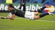 SAVIOUR: The Springboks' Francois Hougaard scores the winning try against Wales during the Rugby World Cup match in Wellington, New Zealand, yesterday. The Boks will need to raise their game when they play Fiji and Samoa after a poor performance Picture: DAVID GRAY/REUTERS