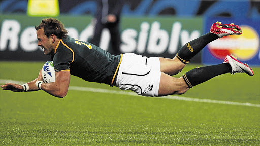 SAVIOUR: The Springboks' Francois Hougaard scores the winning try against Wales during the Rugby World Cup match in Wellington, New Zealand, yesterday. The Boks will need to raise their game when they play Fiji and Samoa after a poor performance Picture: DAVID GRAY/REUTERS