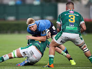 Janko Swanepoel of the Bulls is tackled by Niccolò Cannone of Benetton in the Guinness PRO14 Rainbow Cup final at Stadio Comunale di Monigo in Treviso, Italy on June 19, 2021.