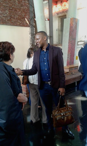 Nkosana Makate at the Constitutional Court just after he won his claim against cellphone giant Vodacom for payment for his idea of the "Please call me" service.