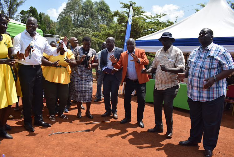 LVSWWDA chairman Odoyo Owidi,KEMSA director Hesborne Omollo, Sony Sugar MD Jared K'Opiyo and Ochieng' Daima at Omolo primary school in Kasipul constituency on August 10,2023