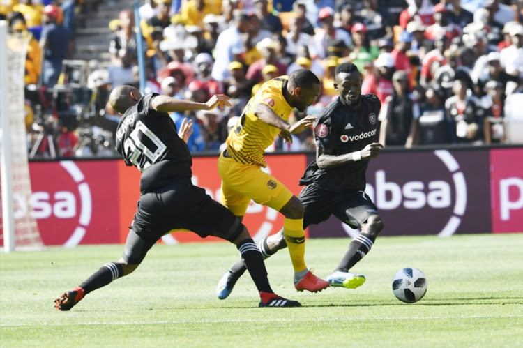 Bernard Parker of Kaizer Chiefs and Augustine Mulenga,Xola Mlambo of Orlando Pirates during the Absa Premiership match between Orlando Pirates and Kaizer Chiefs at FNB Stadium on October 27, 2018 in Johannesburg, South Africa.