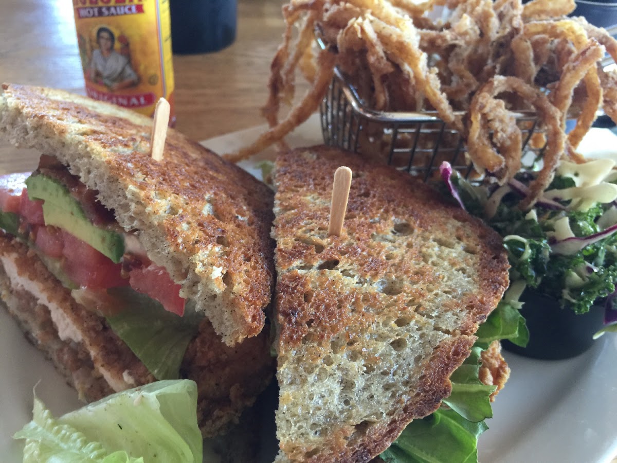 Fried chicken sandwich with onion rings