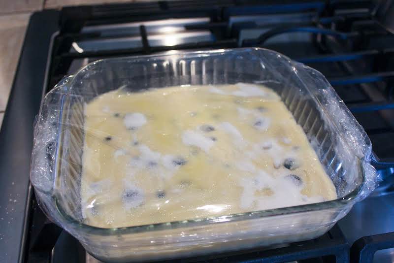 Baking Dish Covered With Plastic Wrap.