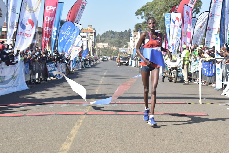 Mercy Kipchumba crosses the finish line to win the third Edition of Eldoret City Marathon on Sunday