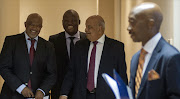 From left, Deputy Finance Minister Mcebisi Jonas, Treasury Director-General Lungisa Fuzile, Minister of Finance Pravin Gordhan and SARS commissioner Tom Moyane in Pretoria