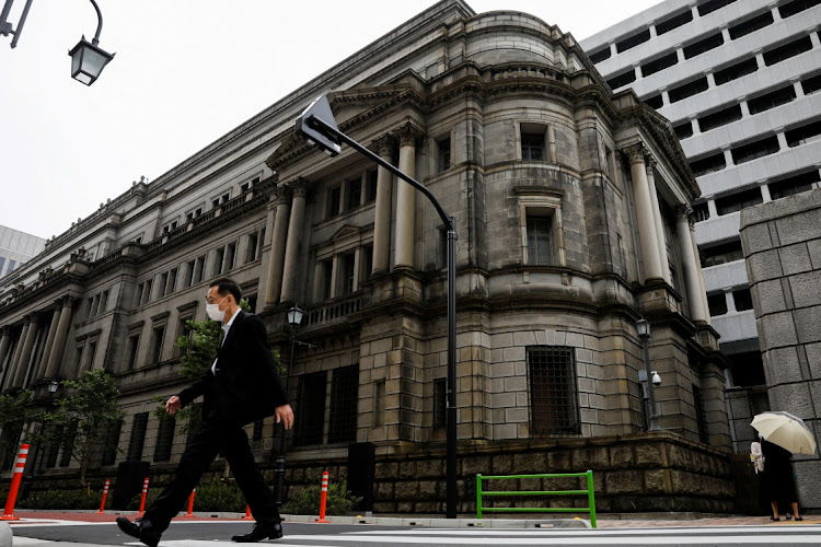 The Bank of Japan's easing policy — which the IMF has described as quite effective — runs counter to a global shift towards monetary tightening, with central banks in the US, Britain and Australia having already raised interest rates.