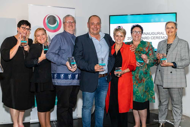 SWEET SUCCESS: Award winners at the inaugural Nelson Mandela Bay Business Event are, from left, Niqui Cloete-Barrass, Shereen van Rooyen of Fat Cats Catering, Alastair Stead of Scan Display, Stefan Ferreira, Linda Harwood, Wendy Knott-Craig of PR Junction and Michelle Brown