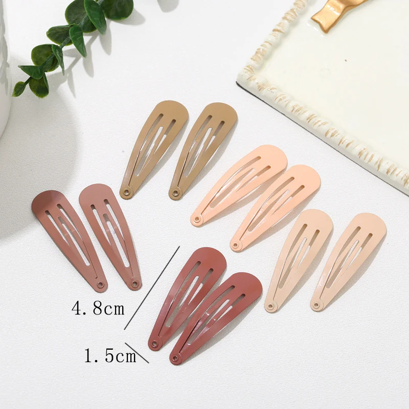 Acessórios de cabelo em formato de rodelas de cebola coloridas Barrettes. Adicione um toque divertido e estiloso ao seu penteado com estes prendedores.