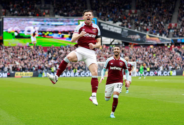 West Ham United's Aaron Cresswell celebrates scoring their first goal against Everton with Said Benrahma at London Stadium, Britain, April 3 2022. Picture: PETER CZIBORRA/REUTERS