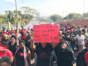 About 800 marchers armed with placards calling for the dismantling of patriarchy and the protection of women make their way through the streets of Durban to the city hall where they will be handing over a memorandum to government during the #TotalShutdown march.