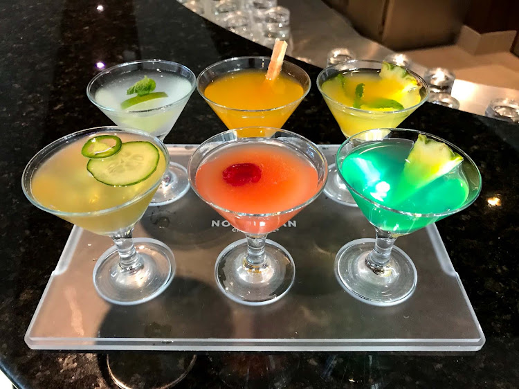 Colorful cocktails served at Sugarcane Mojito Bar on the top deck of Norwegian Jade. 