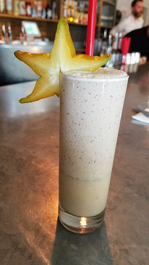 Shipwreck PDX Cocktail of Pina Colada with Plantation Pineapple Rum, Primario Mezcal, Ancho Reyes, Coconut Cream, Pineapple, Cream, Coffee, Salt (also available dairy free)