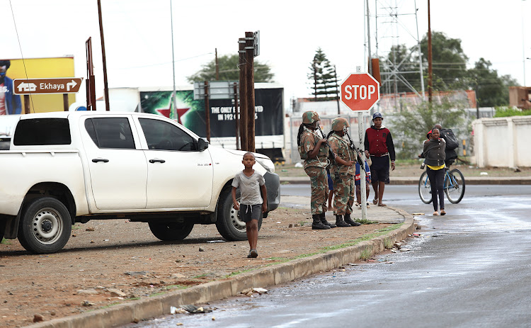 Soldiers patrol the streets of Galeshewe in Kimberley, Northern Cape.