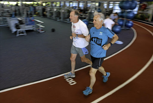 Tony Abrahamson, right, and John Brimble on the training track.