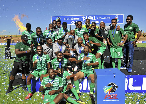 Bloemfontein Celtic players celebrate with the Multichoice Diski Challenge trophy after they were crowned the reserve league champions at Makhulong Stadium in February.