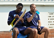 Kagiso Rabada (r) with Charl Langeveldt Bowling coach of South Africa during the Sunfoil Test Series South Africa Training and Press Conference at Kingsmead Stadium, Durban South Africa on 18 August 2016. File photo 