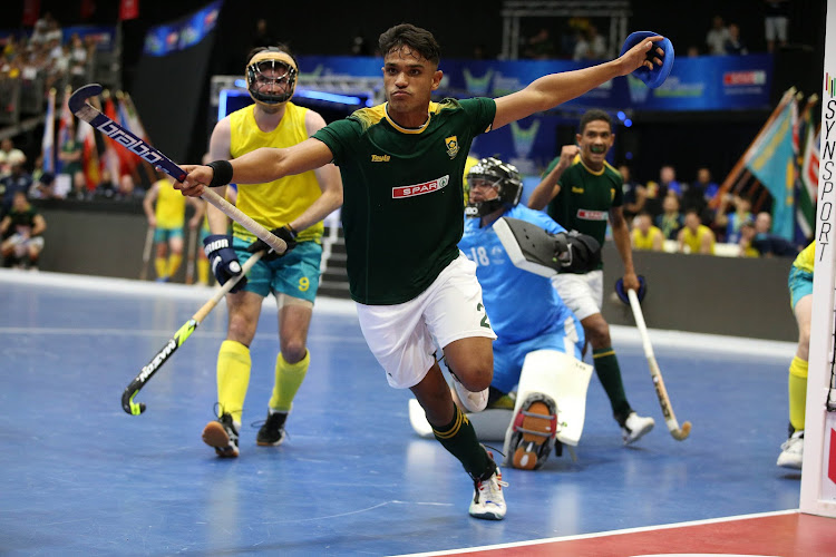 Mustapha Cassiem celebrates his second goal against Australia at the Indoor Hockey World Cup at the Heartfelt Arena in Pretoria on Sunday. Picture: SUPPLIED