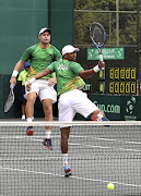 Raven Klaasen and Ruan Roelofse, foreground, during yesterday's Davis Cup tie.