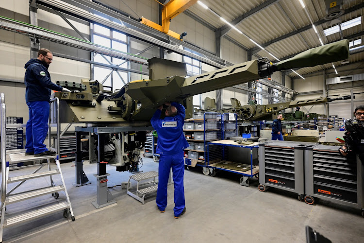 Employees work at a factory in Unterluess, Germany, February 12 2024. Picture: FABIAN BIMMER/REUTERS