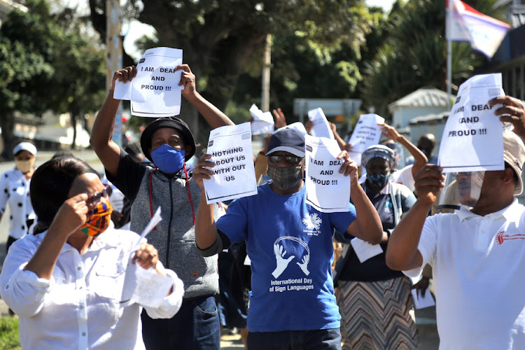 Members of the Buffalo Deaf Association hosted a Silent Walk along Oxford Street on Saturday to create awareness about difficulties deaf people experience in society.