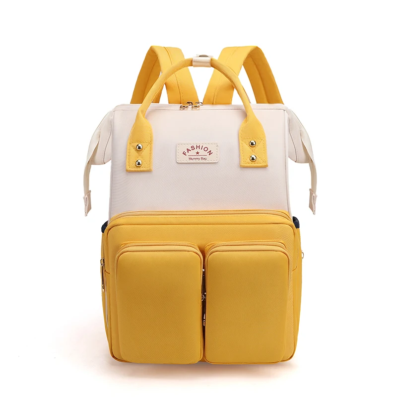 Sac à langer grande capacité, tendance et multifonction pour maman et bébé. Organisation optimale et style irrésistible, idéal pour les sorties.