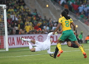 Siphiwe Tshabalala scores South Africa's first goal during the 2010 FIFA World Cup opening match between Bafana Bafana and Mexico on June 11, 2010 in Soweto.