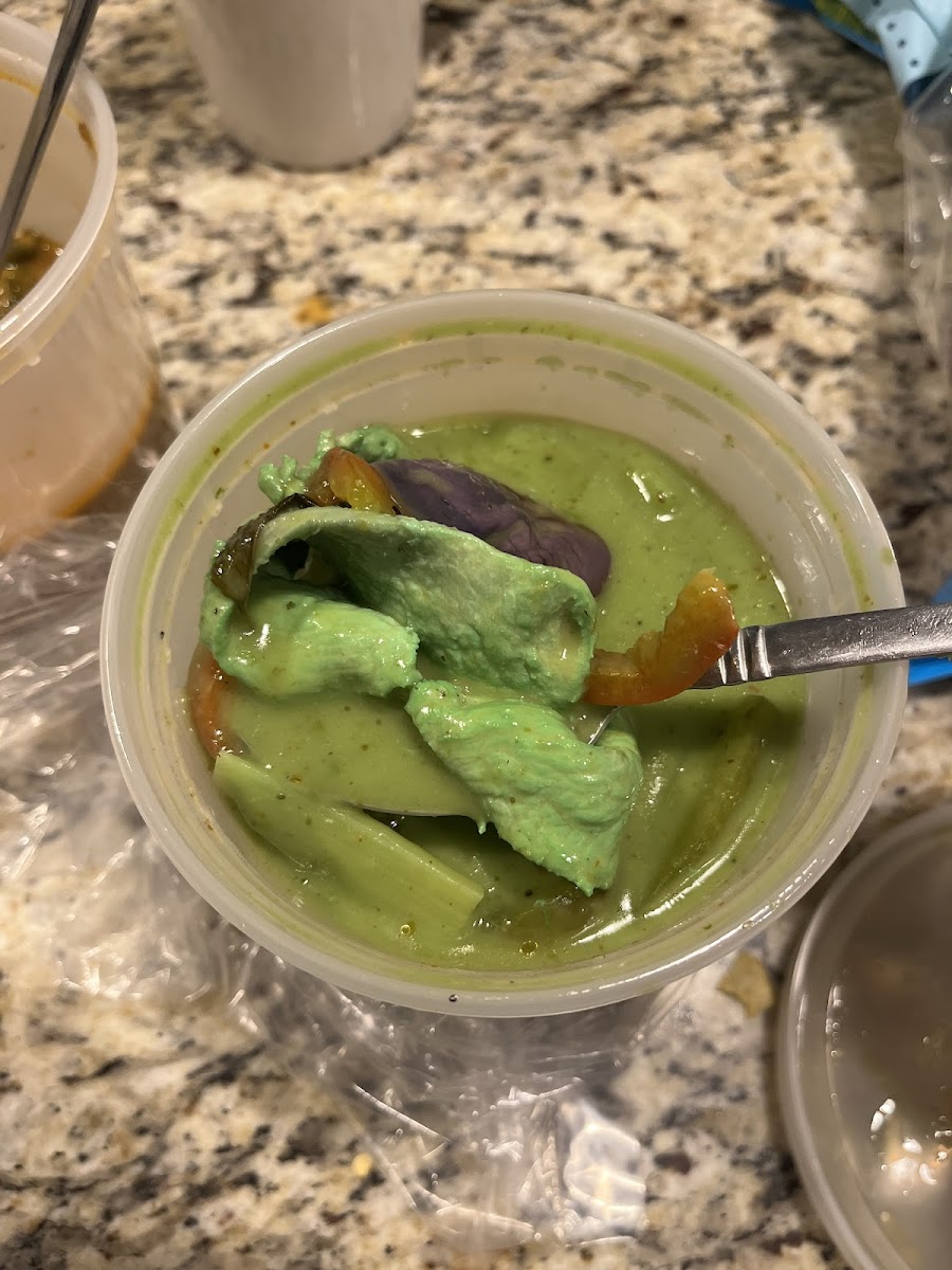 Suspiciously green curry. It tasted good but clearly had some food coloring added.